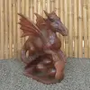 Product image 4 of the product “Dragon with leg lifted on the right made from suar wood, about 50cm Height ”